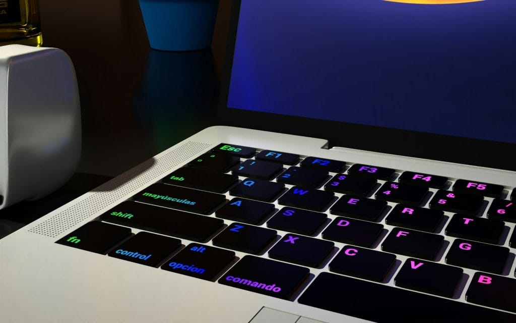 a laptop computer sitting on top of a desk