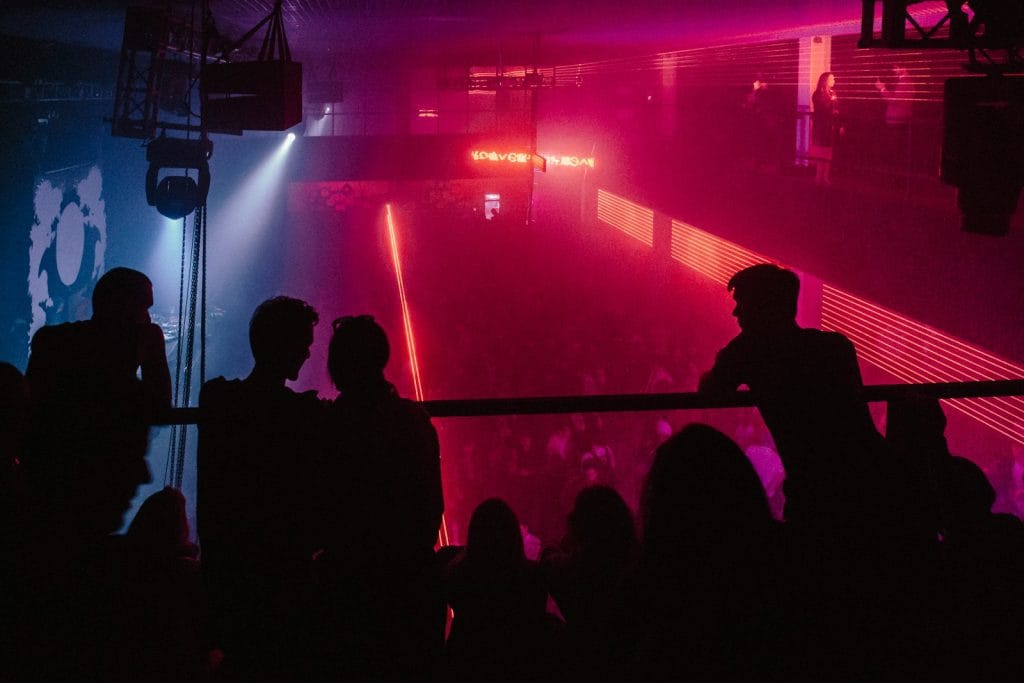 silhouette of people on stand